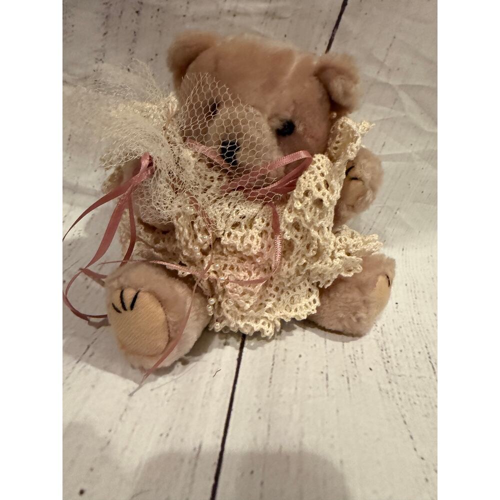 Vintage “Bridal” Bear Wearing a Doiley Dress and holding bouquet